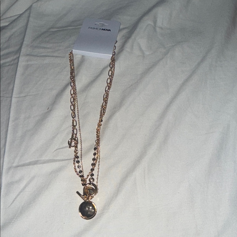 Fashion Nova Gold Layered Pendant Necklace with Black Accent